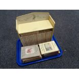 A tray of Peter Rabbit bookshelf together with a quantity of Beatrix potter books