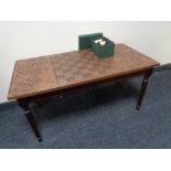 A set of Regency Fine Art chess pieces and a chess board topped coffee table