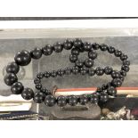 A Whitby Jet beaded necklace CONDITION REPORT: 90cm long. Clasp a/f.