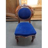 An antique mahogany dining chair