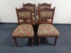 A set of four carved Edwardian mahogany dining chairs (recovered)