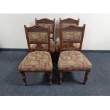 A set of four carved Edwardian mahogany dining chairs (recovered)
