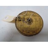 A vintage lawn tennis measure.