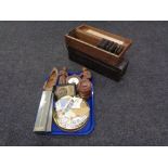 Two boxes of glass slides, tray of stamps, wooden tea caddy, barometer,