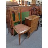 A carved oak occasional chair,