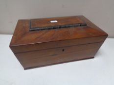 A Victorian inlaid mahogany jewellery box.