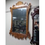 A Victorian mahogany Chippendale style wall mirror.