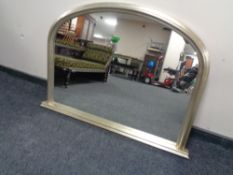 A John Lewis silvered overmantel mirror CONDITION REPORT: 115cm by 81cm.