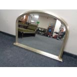 A John Lewis silvered overmantel mirror CONDITION REPORT: 115cm by 81cm.