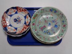 A tray of two Imari wall plates together with two Chinese famille rose plates