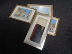 A framed signed print of a street scene and four further prints