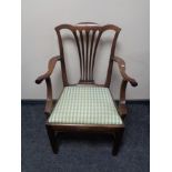 An antique mahogany Hepplewhite style dining chair