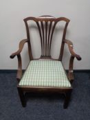 An antique mahogany Hepplewhite style dining chair