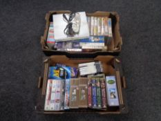A box of Liton dvd player with remote, two boxes of vhs tapes,