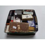 A box of playing cards, brass ware, pocket knife,