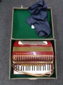 A cased Hohner Atlantic IV accordion