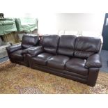 A brown leather three seater settee and matching armchair