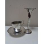 A silver fluted vase, together with a silver paten, and small silver cup.