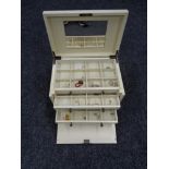A contemporary dome topped jewellery box fitted with five internal drawers, costume jewellery,