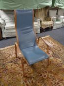 A mid 20th century teak framed Bentwood designer armchair in blue leather CONDITION