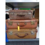 Three vintage luggage cases