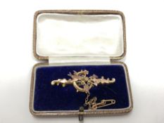 A 9ct gold Victorian brooch modelled as birds on a branch