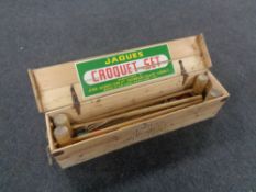 A pine-cased Jacques croquet set.