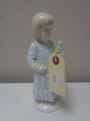 A Coalport figure, Christmas Angel,