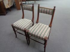 A pair of continental occasional chairs