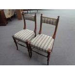 A pair of continental occasional chairs