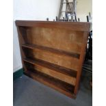 A set of 20th century oak open shelves