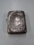 A silver vesta case