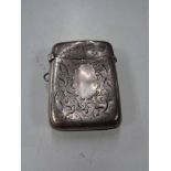 A silver vesta case