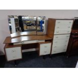 A mid 20th century G Plan E Gomme designed dressing table and matching seven drawer chest