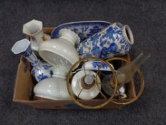 An antique converted oil lamp, blue and white pattern meat plate,