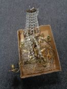 A box of antique brass two way wall sconces with glass drops and a hanging light fitting