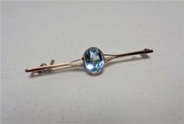 A yellow gold aquamarine brooch