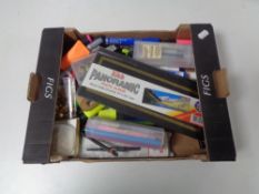 A box of assorted stationery.