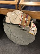 A round contemporary flower mirror,