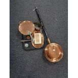 A copper bed warming pan together with a tray of lidded pan and pot, Cloisonne hand bell,