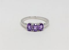 A silver amethyst dress ring,