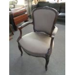 A stained beech salon armchair