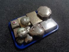 A tray of metal trinket and jewellery boxes.