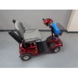 A mobility scooter with key and charger
