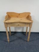 An early twentieth century pine washstand fitted a drawer