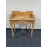 An early twentieth century pine washstand fitted a drawer