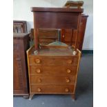 A mid 20th century four drawer chest and a sewing trolley