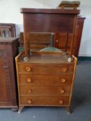 A mid 20th century four drawer chest and a sewing trolley