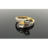 A 10ct gold mystic topaz ring, size O1/2.