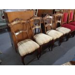 A set of six antique walnut dining chairs